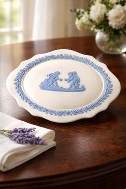 Wedgwood Blue and White Jasperware Oval Lidded Trinket Box with Cherub Relief